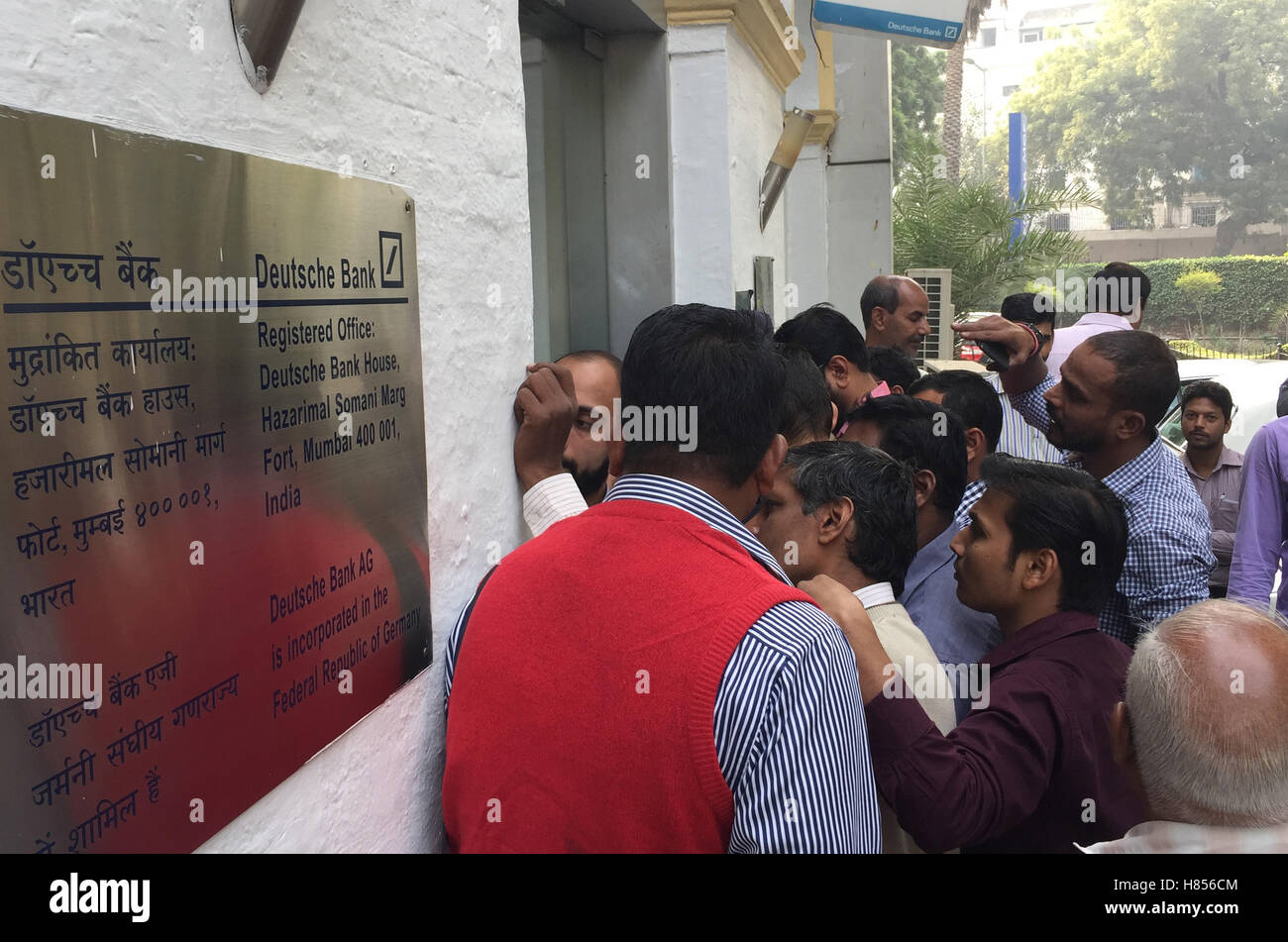 New Delhi, India. 10th Nov, 2016. A large crowd gathers outside a