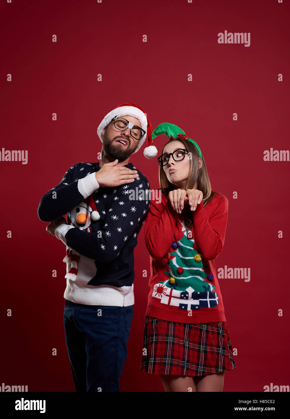 Nerd couple in Christmas time Stock Photo