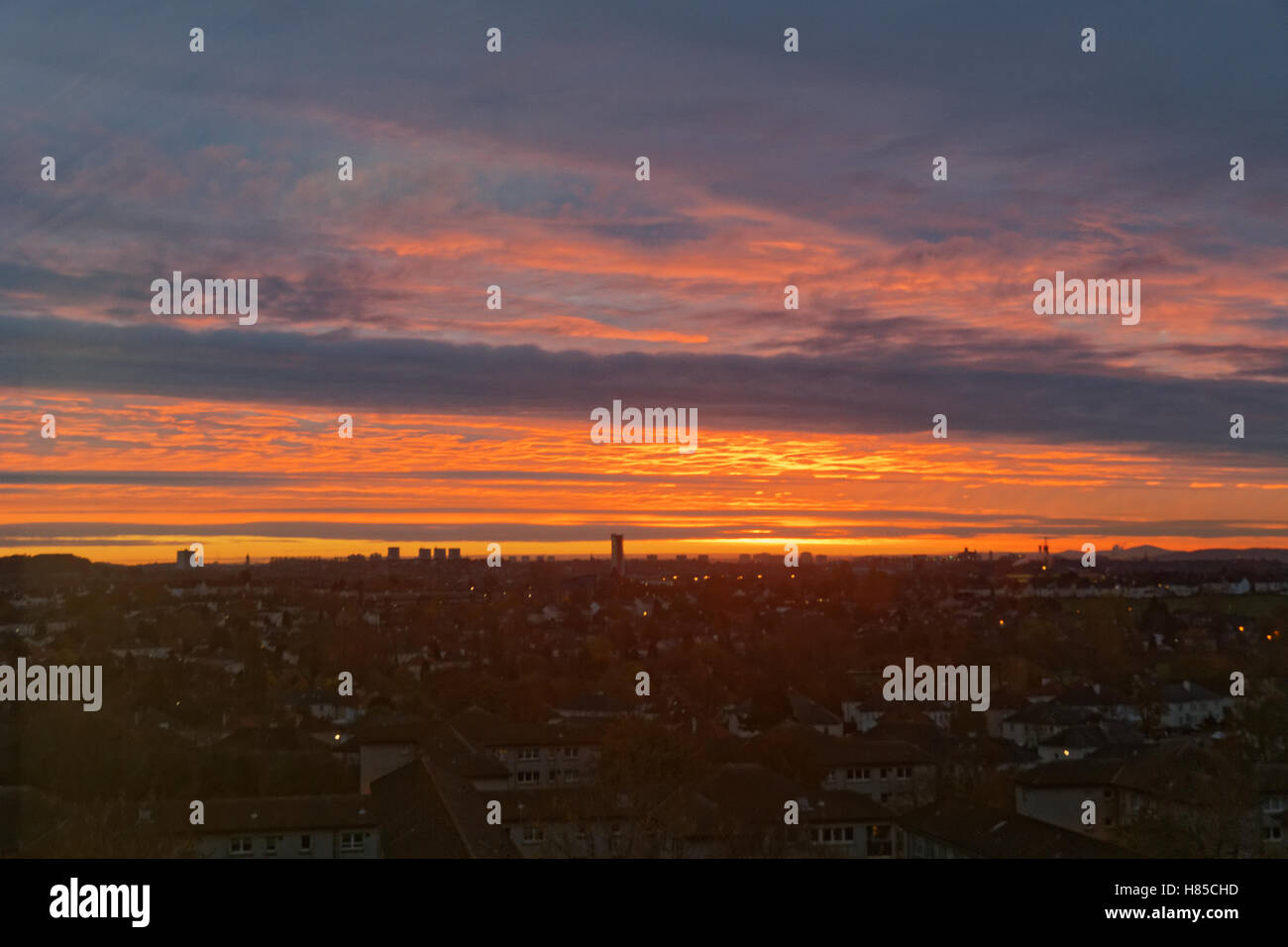 Frosty morning sky over Glasgow as the sun rises Stock Photo