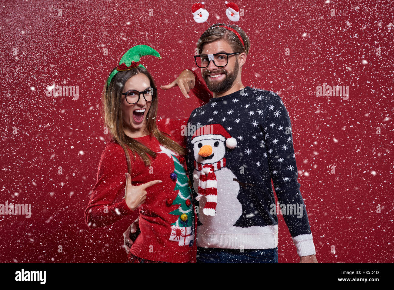 Insane couple with funny cardigans Stock Photo