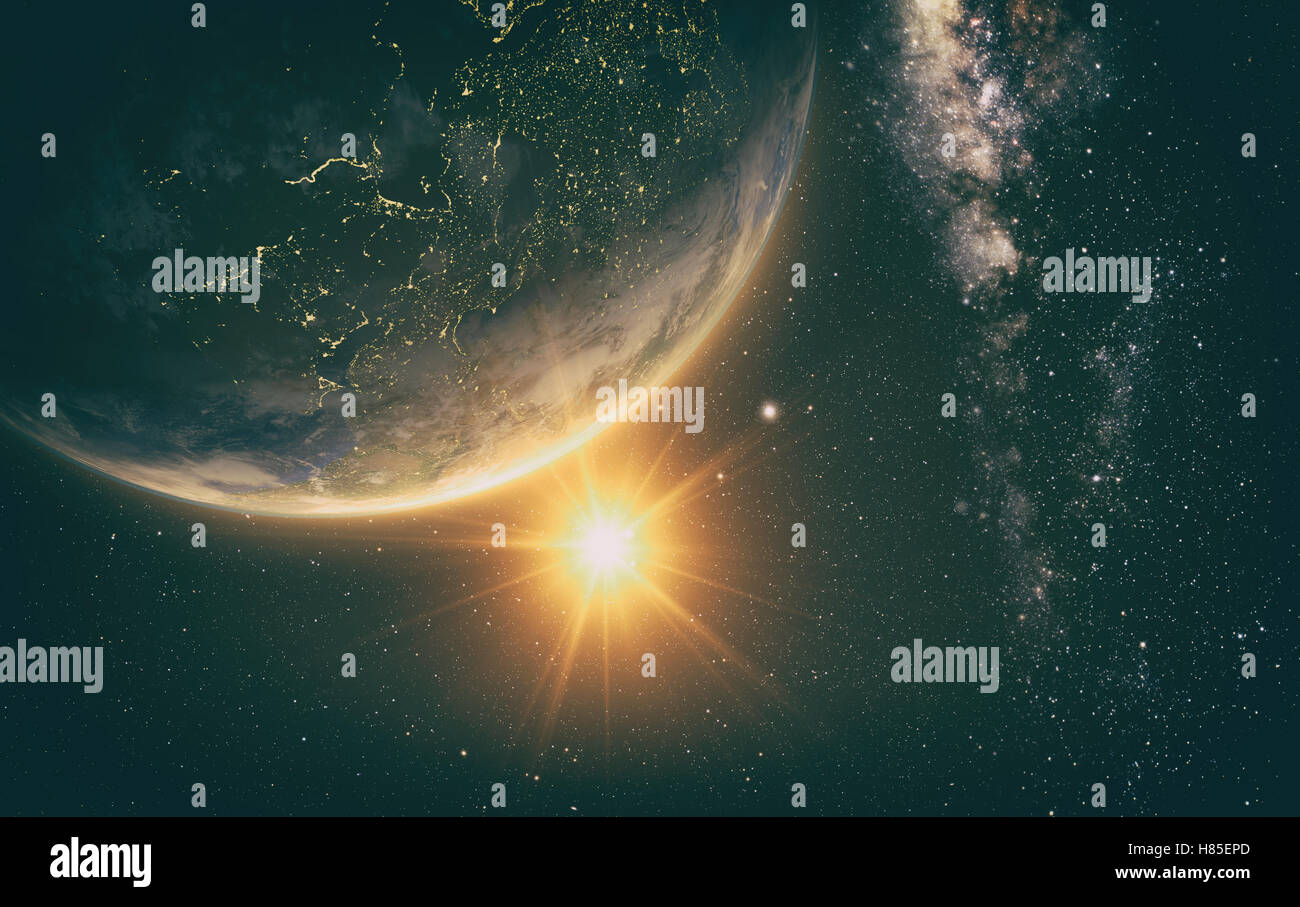 Planet Earth with a spectacular sunrise with milkyway in the background ...
