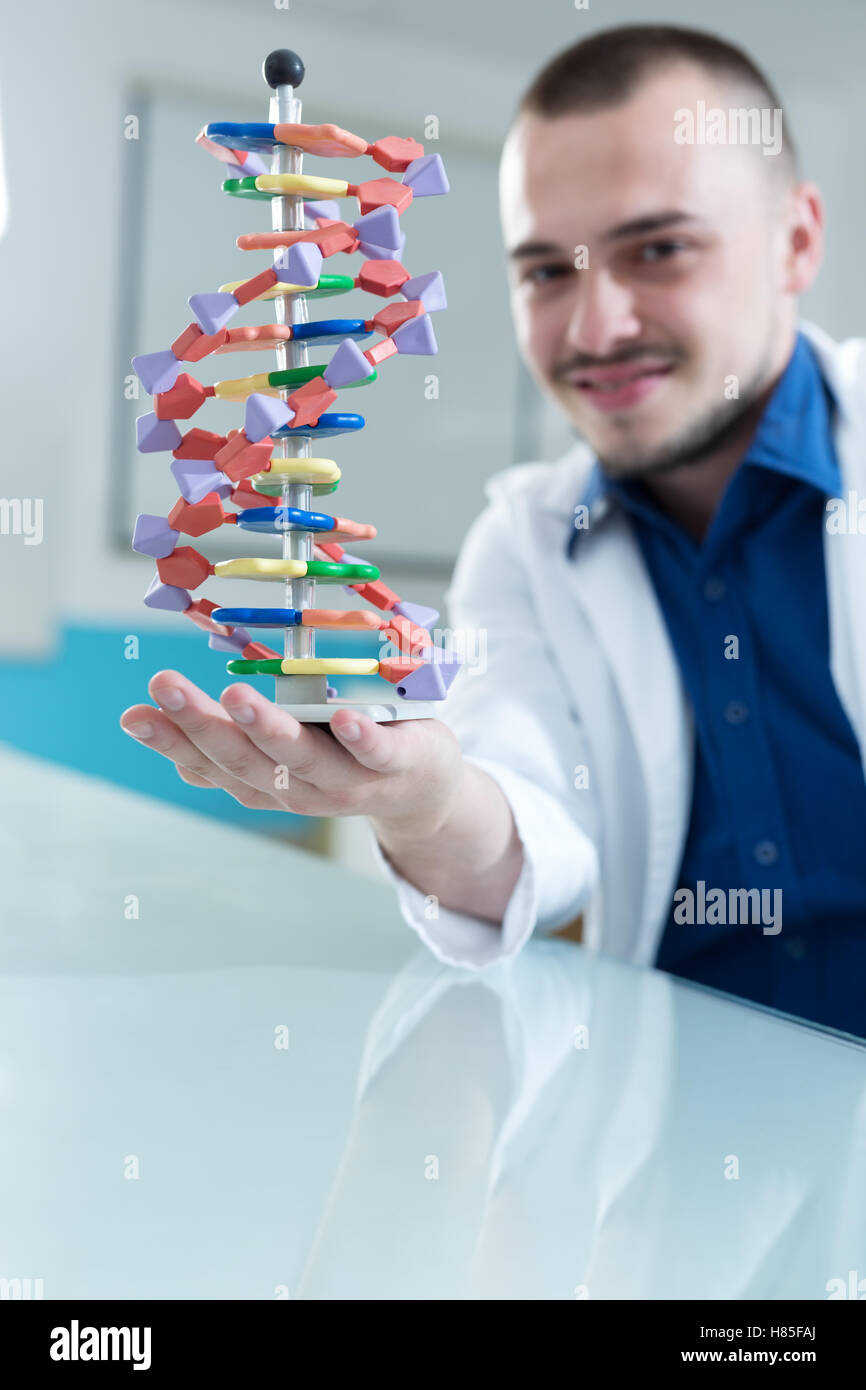 New technologies in medicine. Scientist and molecule of DNA Stock Photo