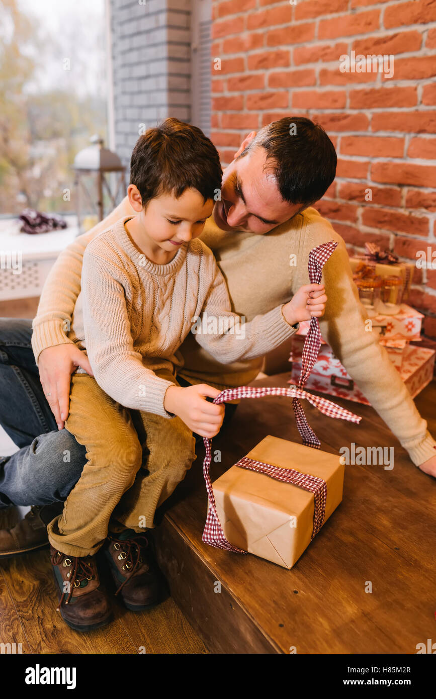 Father christmas giving gift hires stock photography and images Alamy