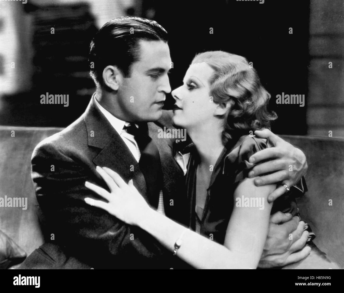 Feuerkopf, (RED HEADED WOMAN) USA 1932 s/w, Regie: Jack Conway, CHESTER MORRIS, JEAN HARLOW, Key: Paar, Umarmung Stock Photo