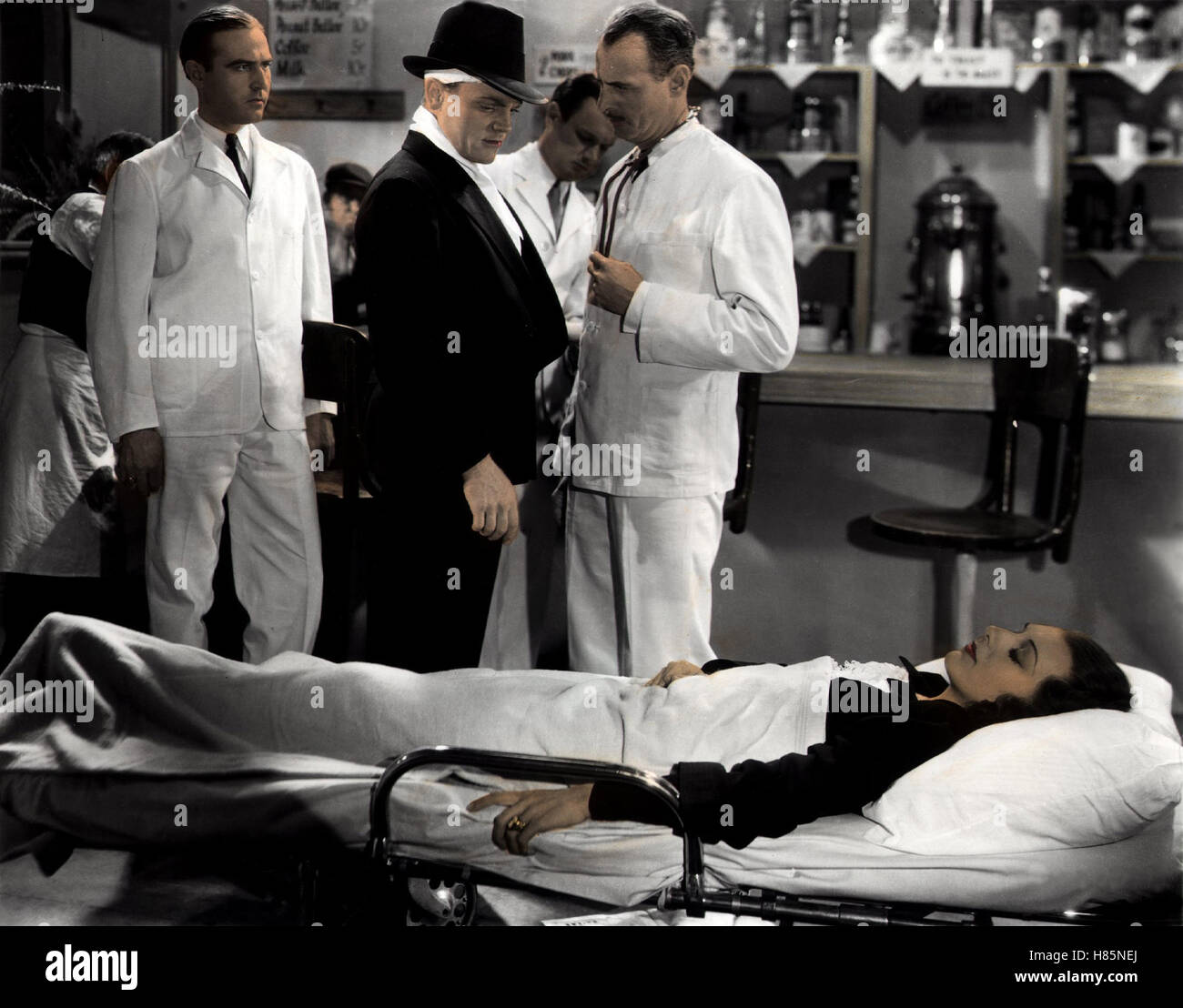 Der FBI-Agent, (G-MEN) USA 1935 s/w, Regie: William Keighley, JAMES CAGNEY, ANN DVORAK, Stichwort: Ärzt, Verletzte, Krankenbett, Unfall-Aufnahme Stock Photo