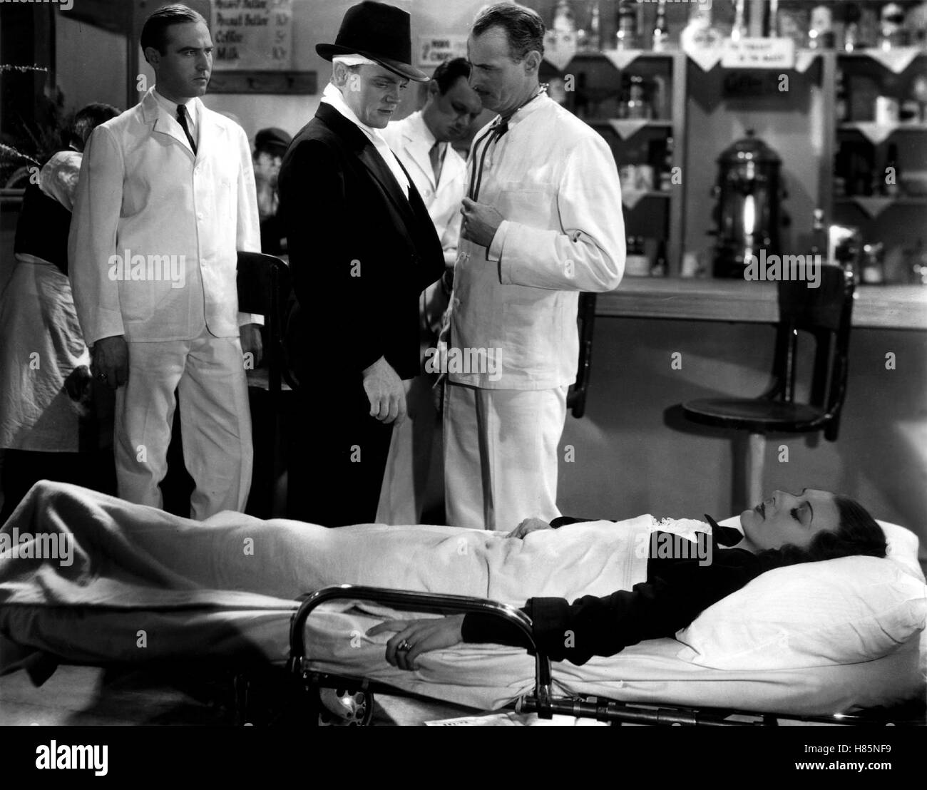 Der FBI-Agent, (G-MEN) USA 1935 s/w, Regie: William Keighley, JAMES CAGNEY, ANN DVORAK, Stichwort: Ärzt, Verletzte, Krankenbett, Unfall-Aufnahme Stock Photo