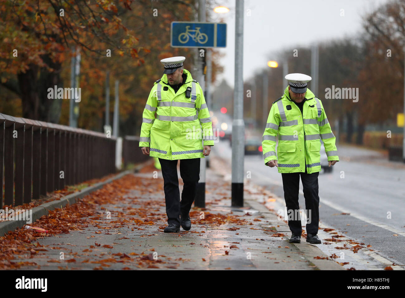 Police near the scene in Queen's Avenue, Aldershot, where two teenage