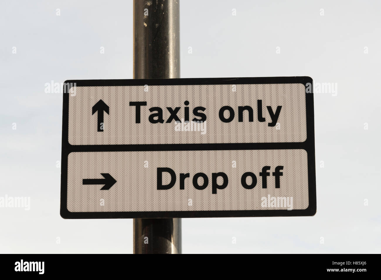 A taxi rank drop off and pick up sign UK Stock Photo
