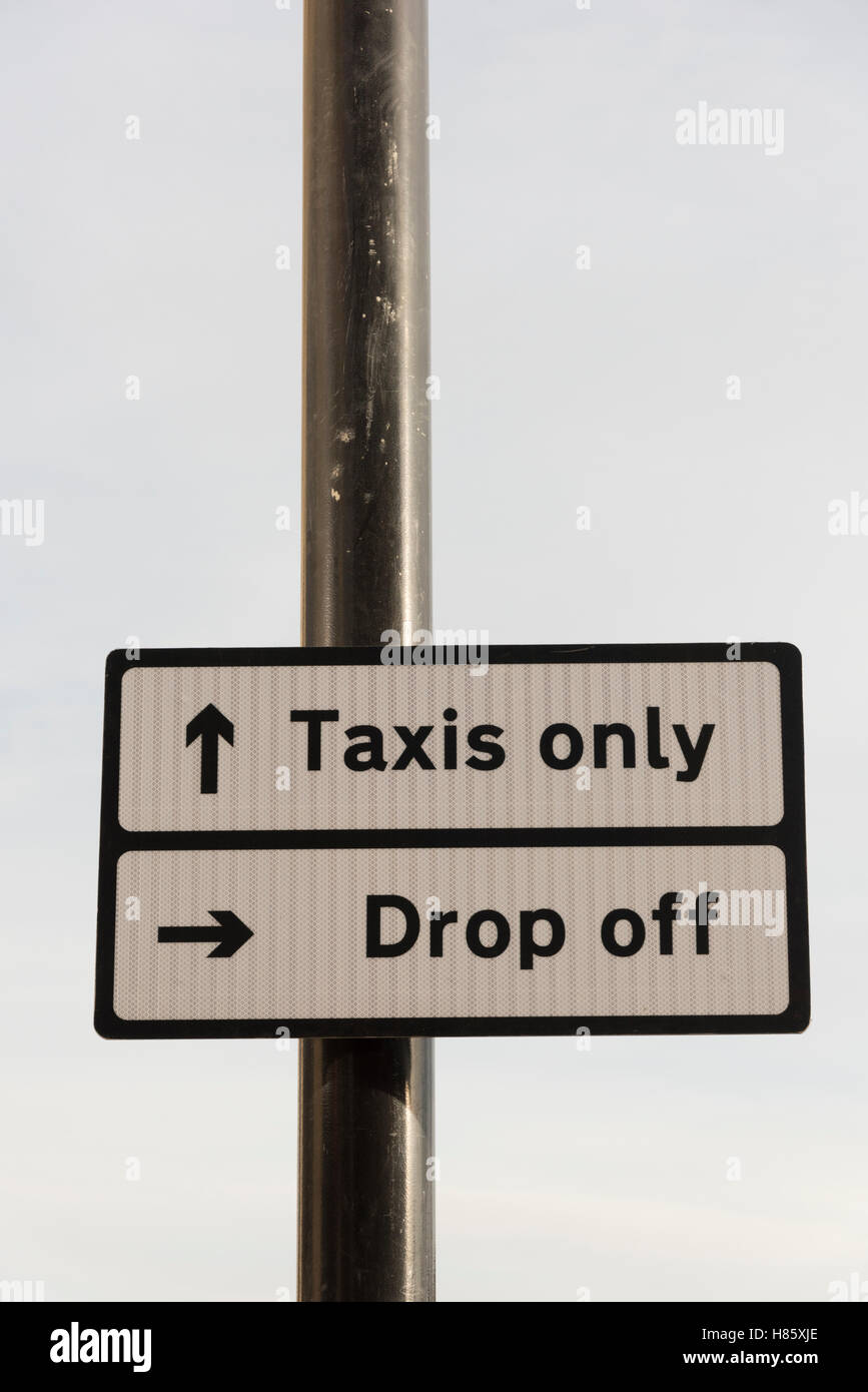 A taxi rank drop off and pick up sign UK Stock Photo