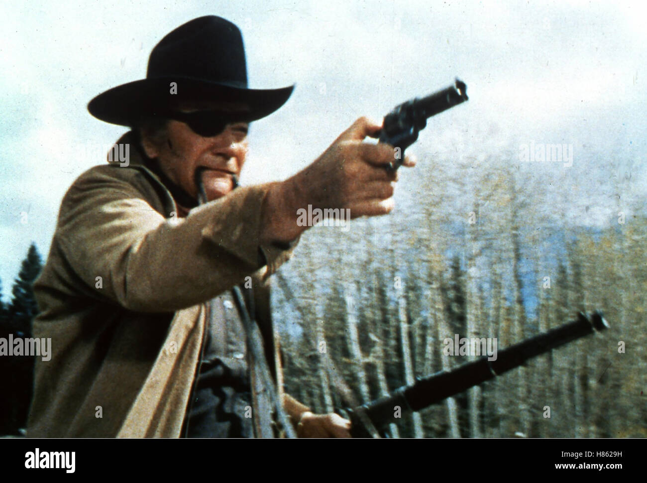 True grit 1969 john wayne hi-res stock photography and images - Alamy