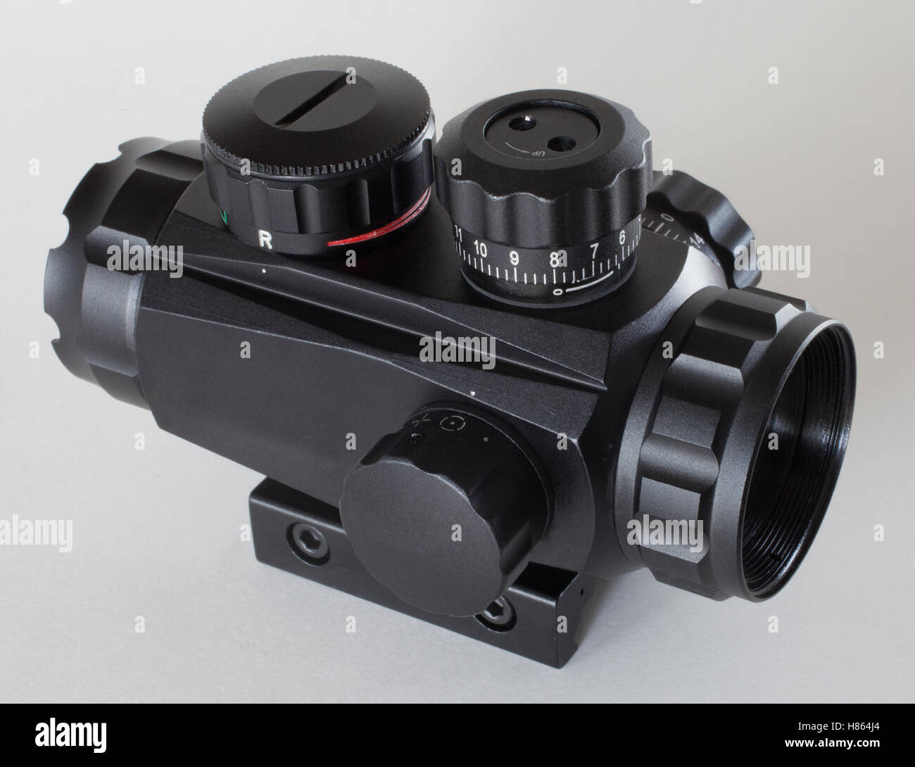 Rifle scope with adjustment knobs on a white background Stock Photo Alamy