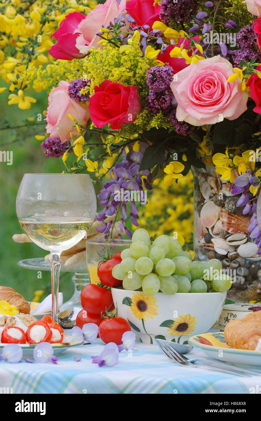 Rose (Rosa sp) flowers with wine and fruit Stock Photo Alamy