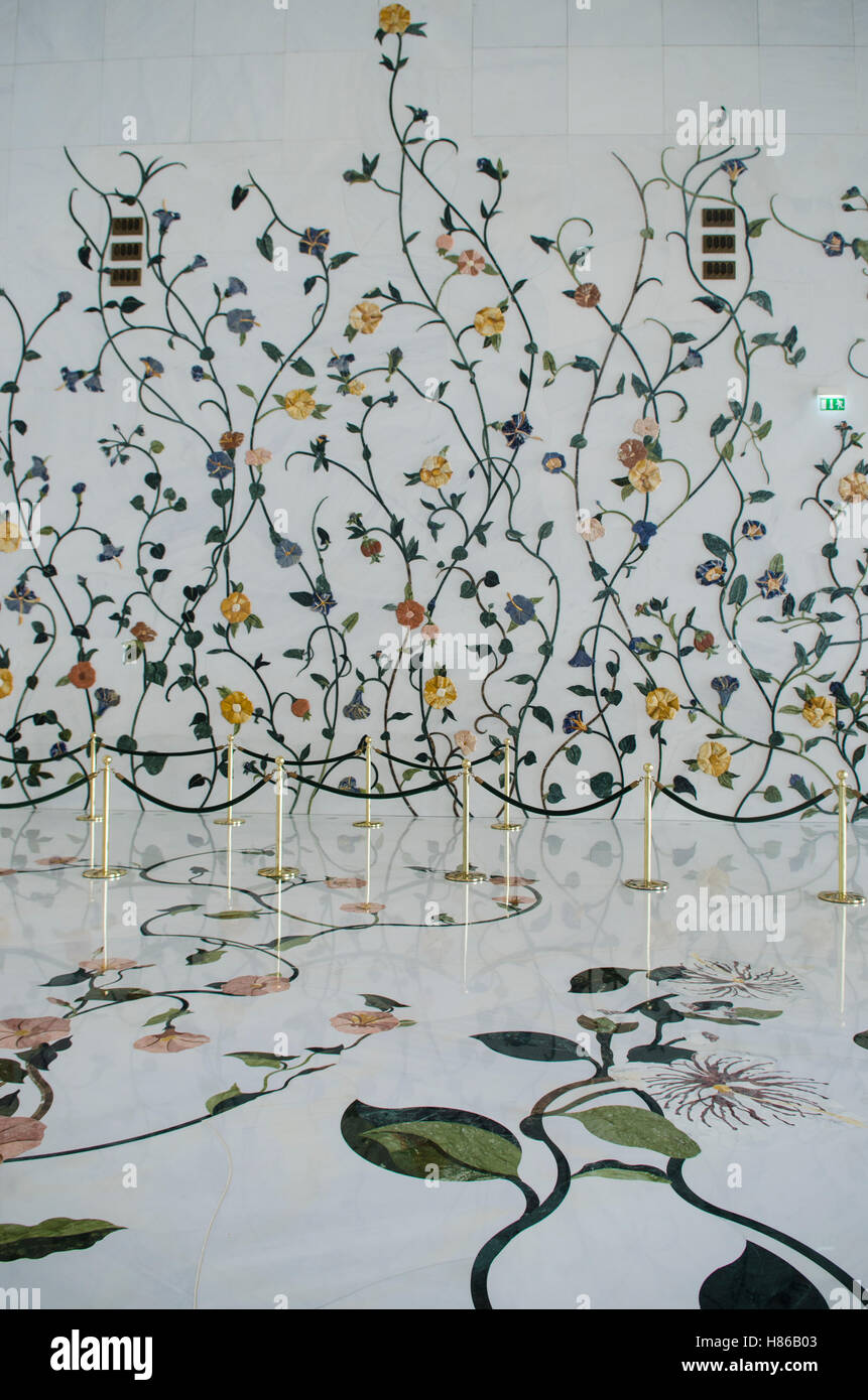 Floral decorations on the ground of Sheikh Zayed Grand Mosque building exteriors Abu Dhabi United Arab Emirates Stock Photo