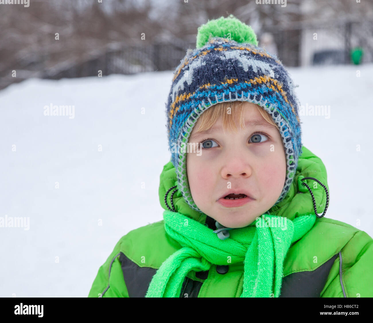 Surprised five years old boy Stock Photo