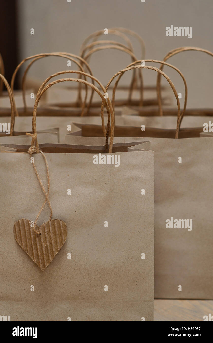 kraft paper bag for gifts on table Stock Photo