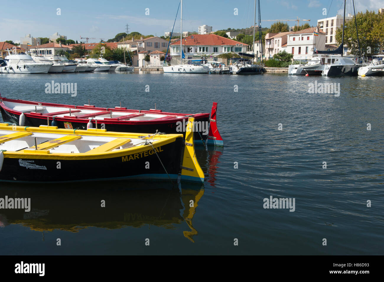 Traditional pointus fishing boats moored in the port of Martigues, often called the Venice of Provence. Stock Photo