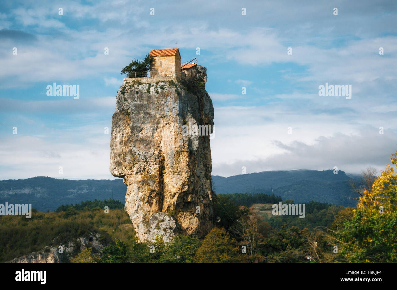 Katskhi pillar. Georgian landmarks. The church on a rocky cliff. Stock Photo