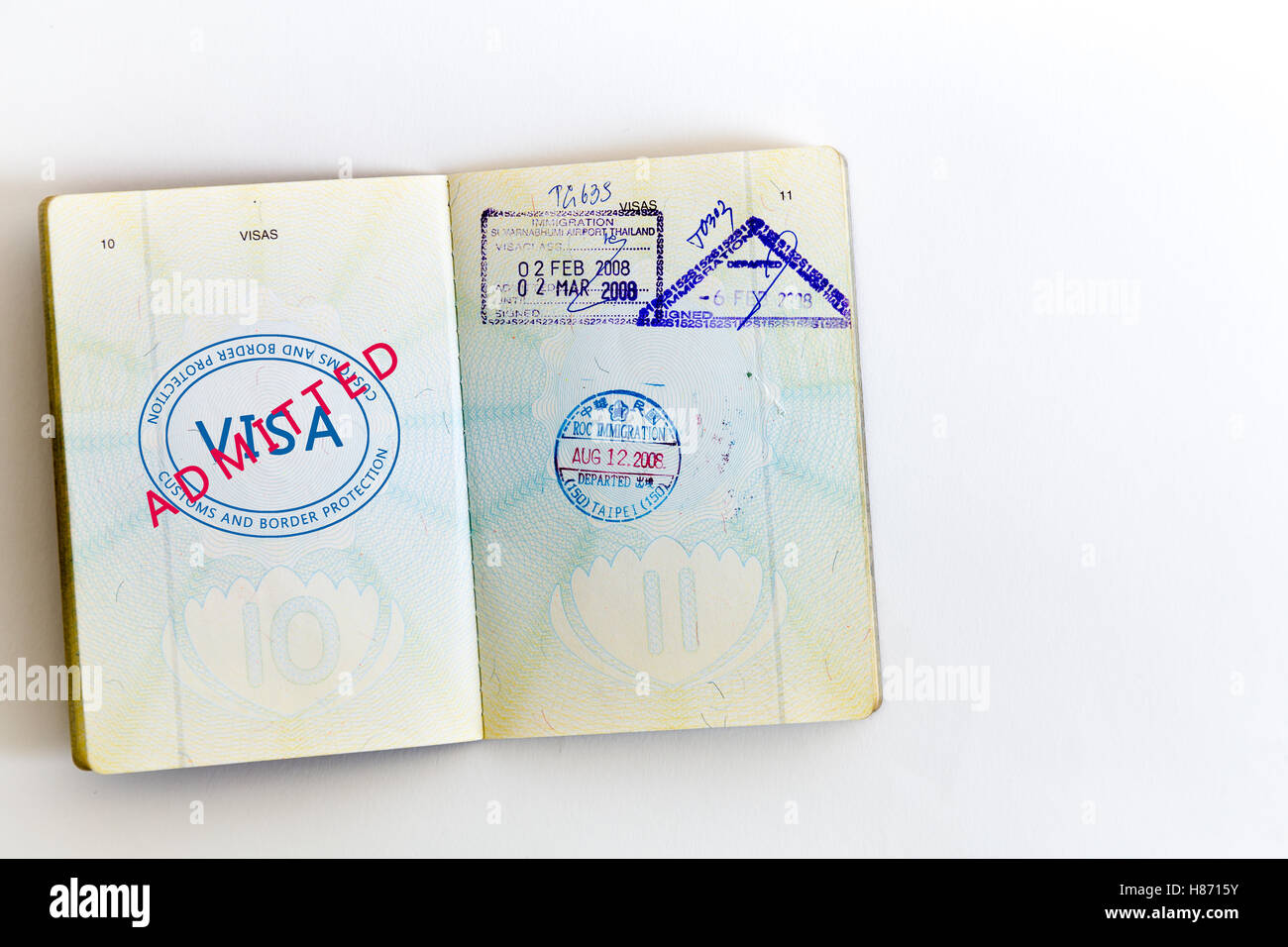 Visa admitted and customs stamps in passport Stock Photo Alamy