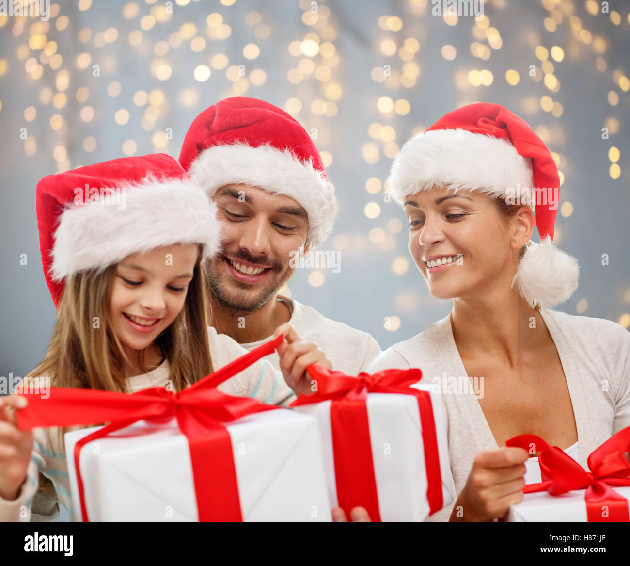 happy family with christmas gift boxes Stock Photo - Alamy