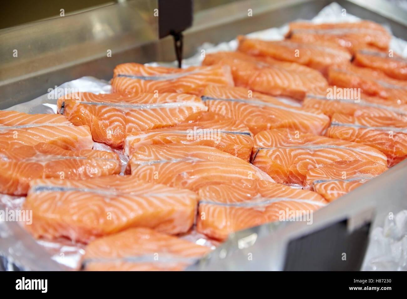 salmon fish at food market stall Stock Photo Alamy