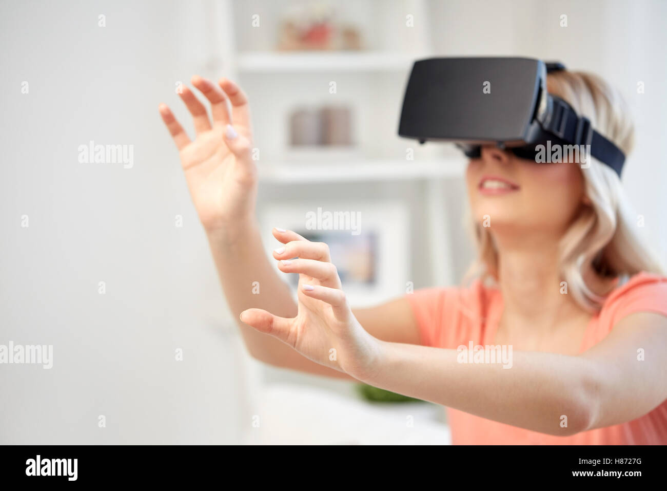 woman in virtual reality headset or 3d glasses Stock Photo Alamy