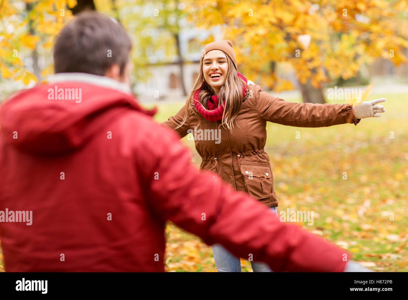 happy young couple meeting in autumn park Stock Photo - Alamy