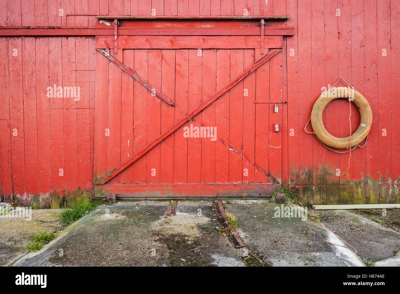 Closed gate of Norwegian fishing barn, background texture Stock Photo