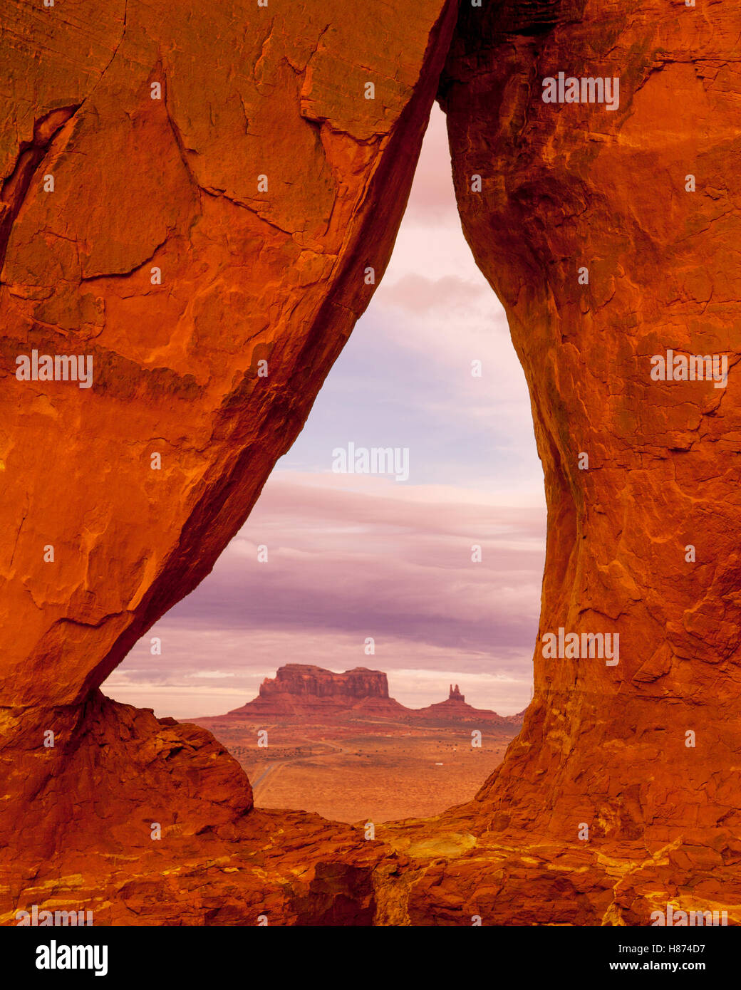 Buttes and mesas seen through arch, Teardrop Arch, Monument Valley