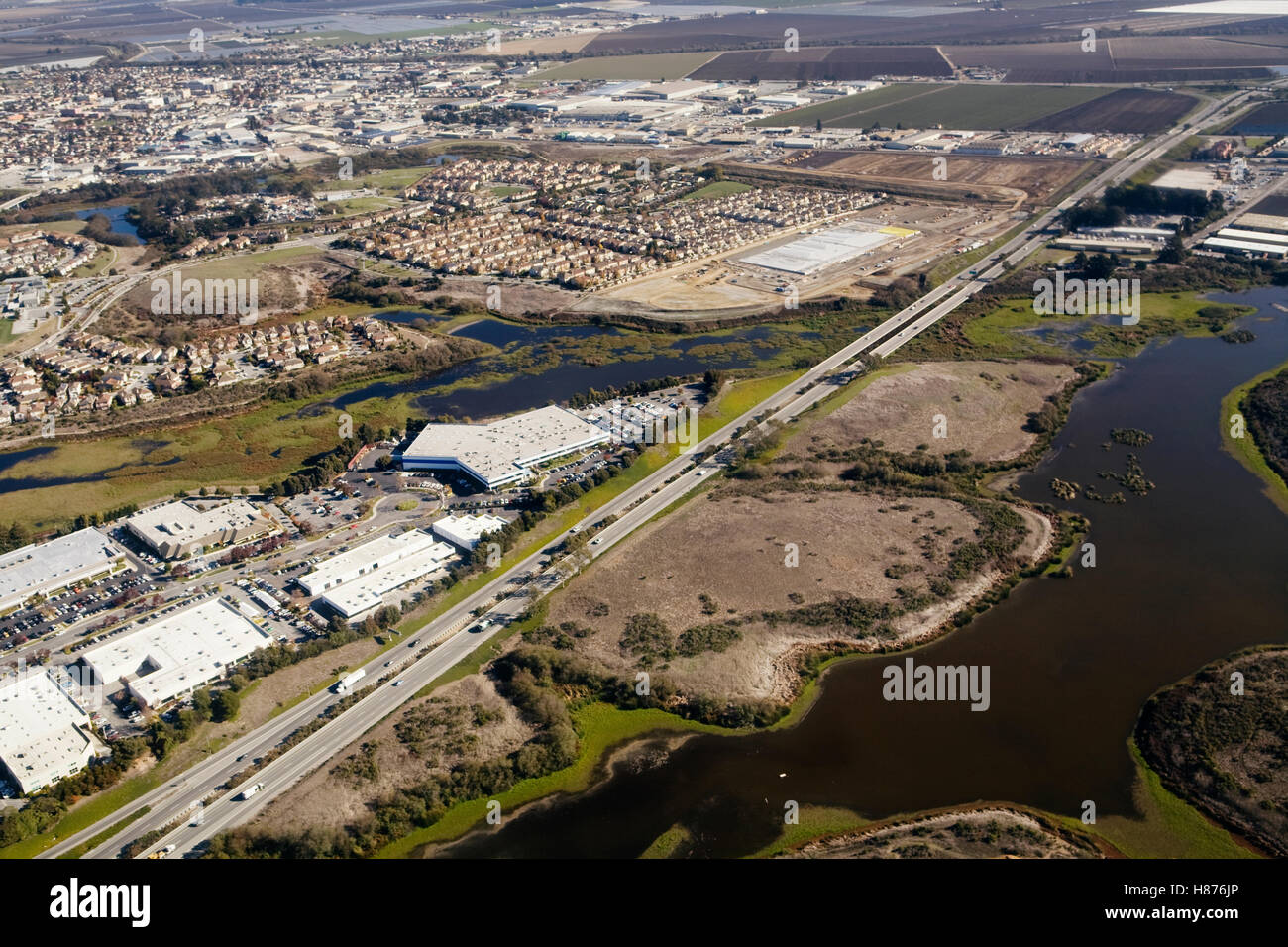 Commerical and suburban developments encroaching on wetlands, Watonville, Monterey Bay, California Stock Photo