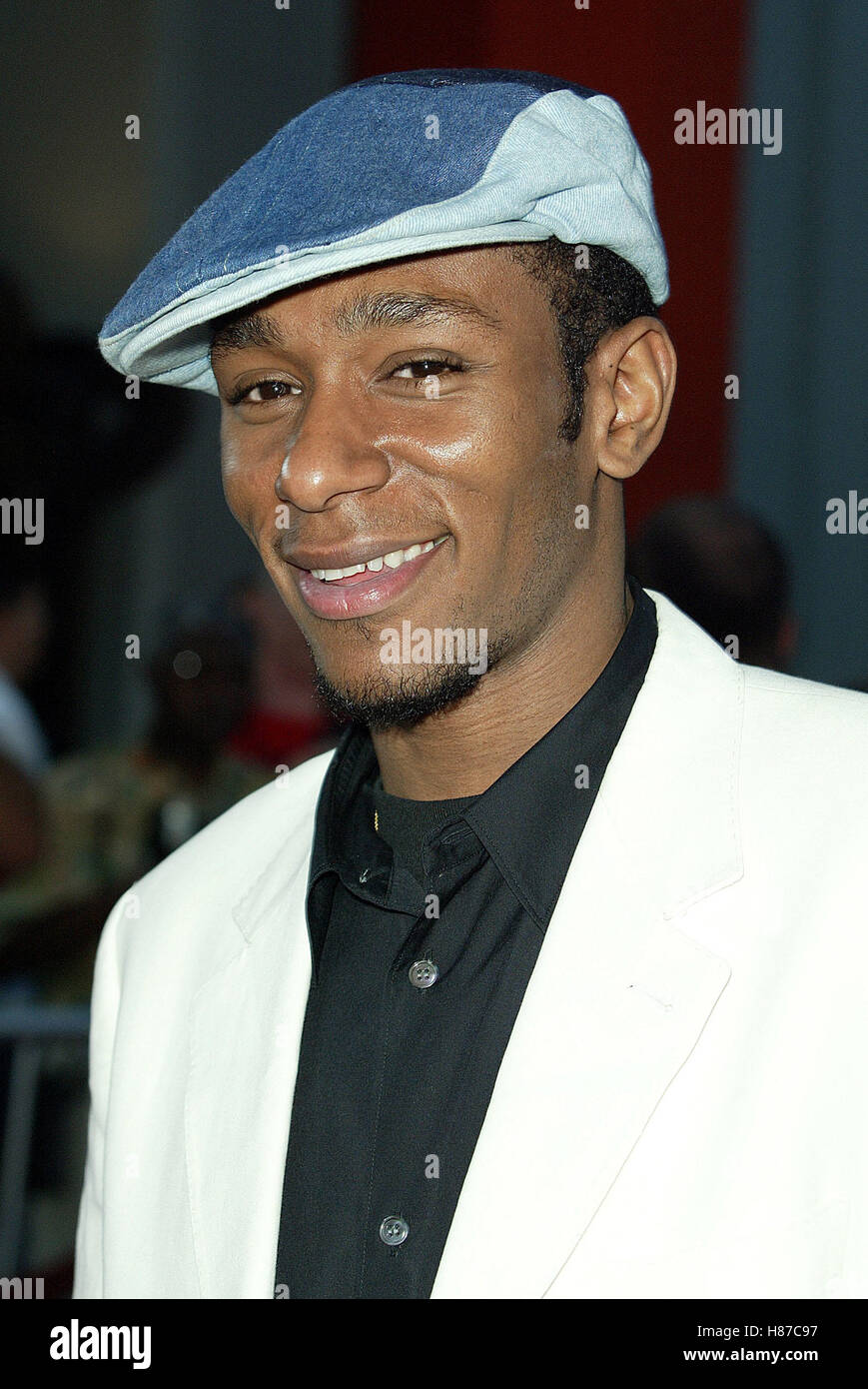 Mos Def getting into a limousine with his family after arriving at LAX  airport Los Angeles, California - 29.10.09 Stock Photo - Alamy