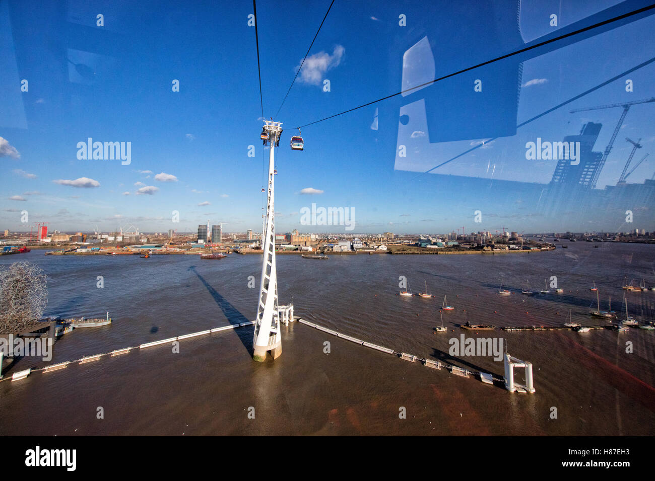 Emirates Air Line gondola cable car across the River Thames from the