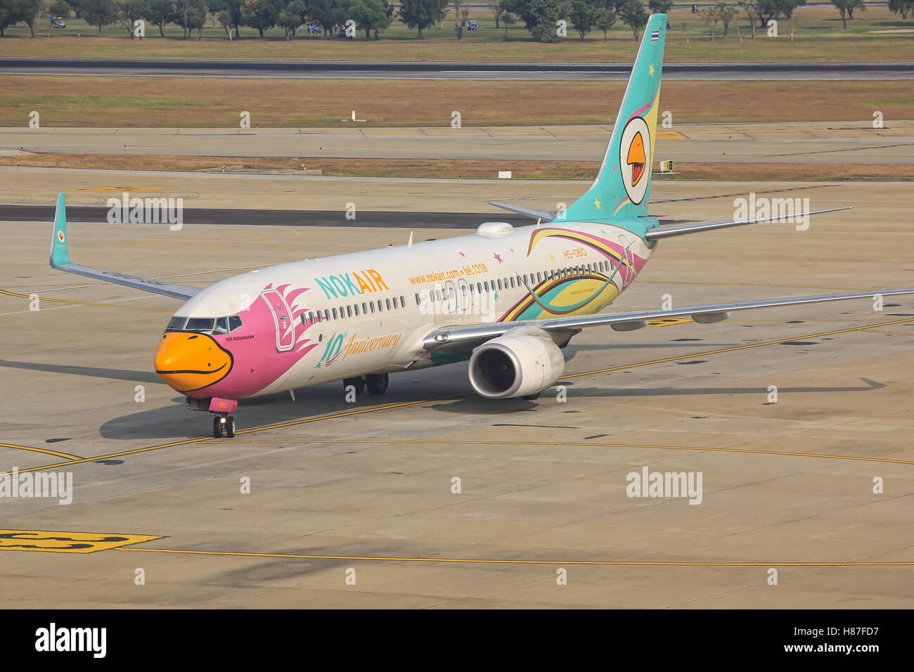 BANGKOK, THAILAND - JULY 24, 2015: Nok Air Boeing 737s ready for take off at Donmuang Airport. Stock Photo