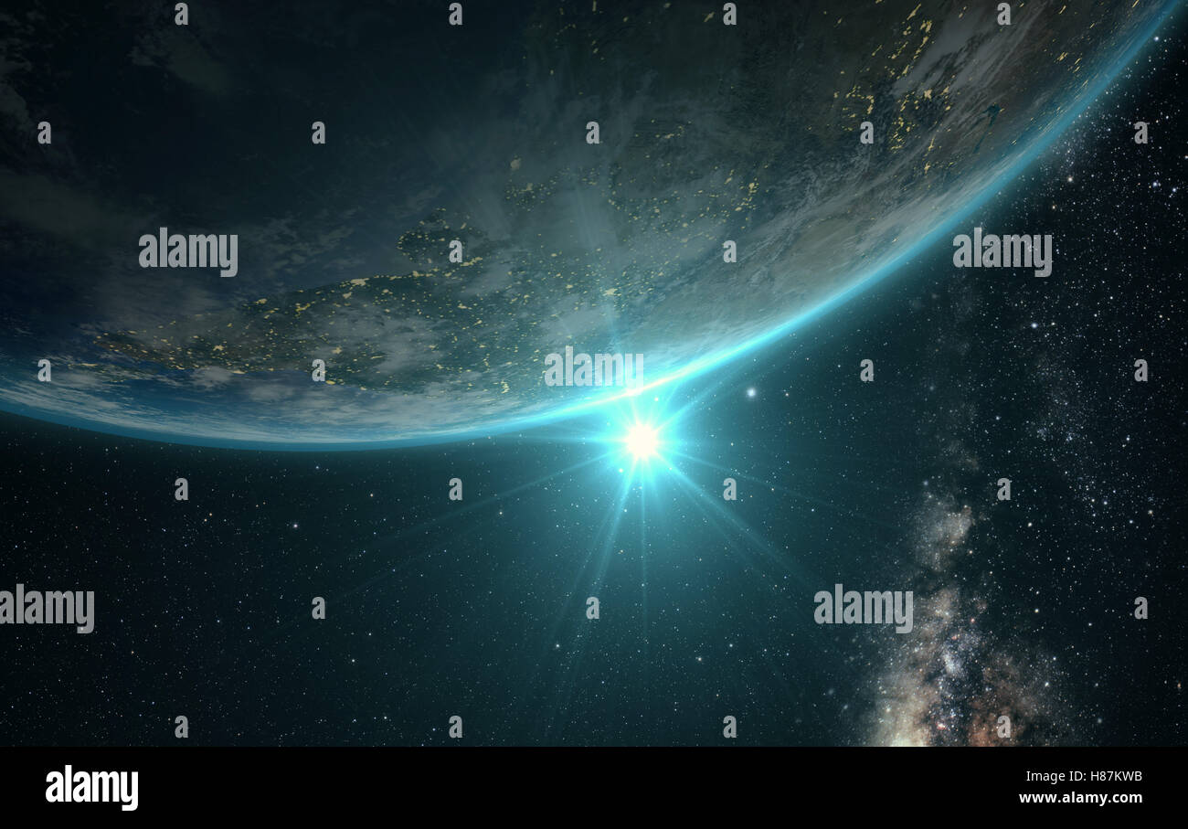 Planet Earth with a spectacular sunrise with milkyway in the background ...