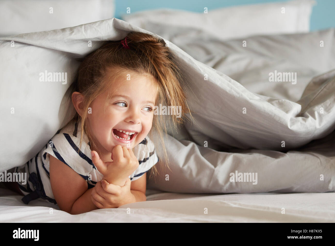 Hiding under sheets hires stock photography and images Alamy