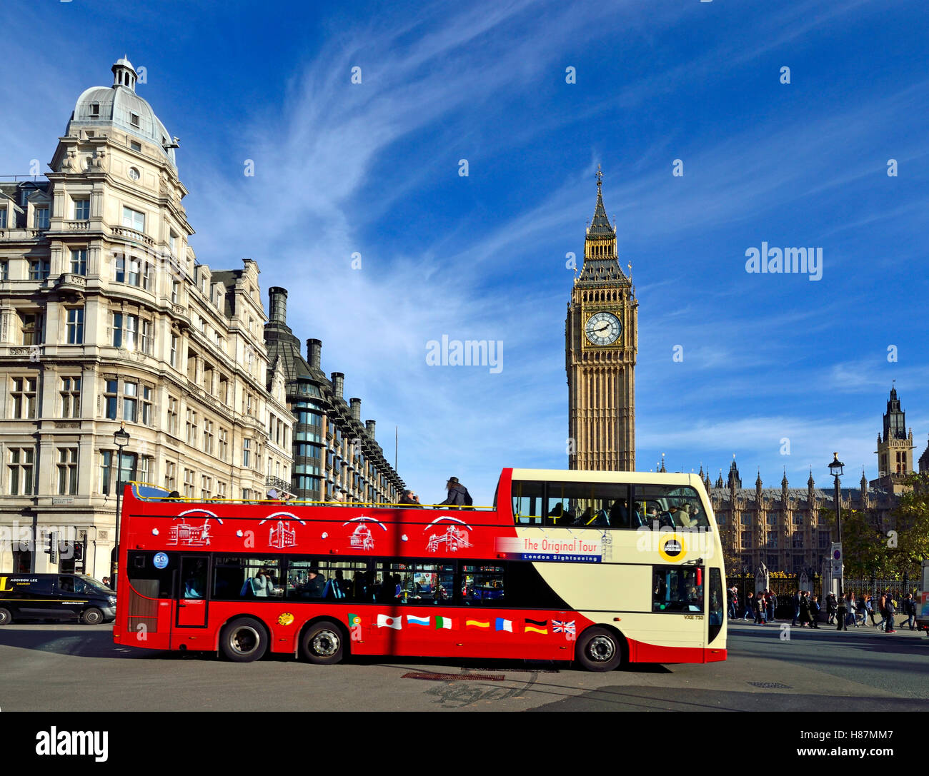 London, England, UK. Double-decker tourist sightseeing bus in Parliament Square Stock Photo