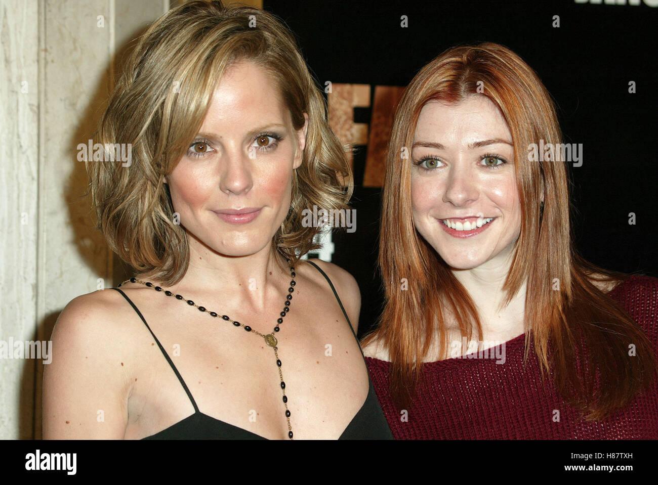 EMMA CAULFIELD ALYSON HANNIGAN DARKNESS FALLS SCREENING WESTWOOD LOS  ANGELES USA 22 January 2003 Stock Photo - Alamy, image size:1300x959