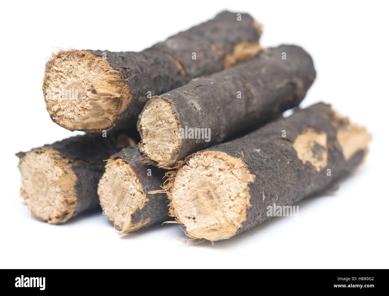 stack of firewood isolated on white background Stock Photo - Alamy