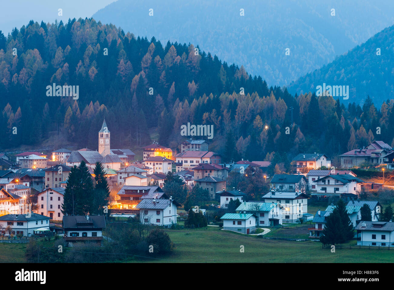 Moody autumn dawn at Vigo di Cadore, Dolomites, Italy. Stock Photo
