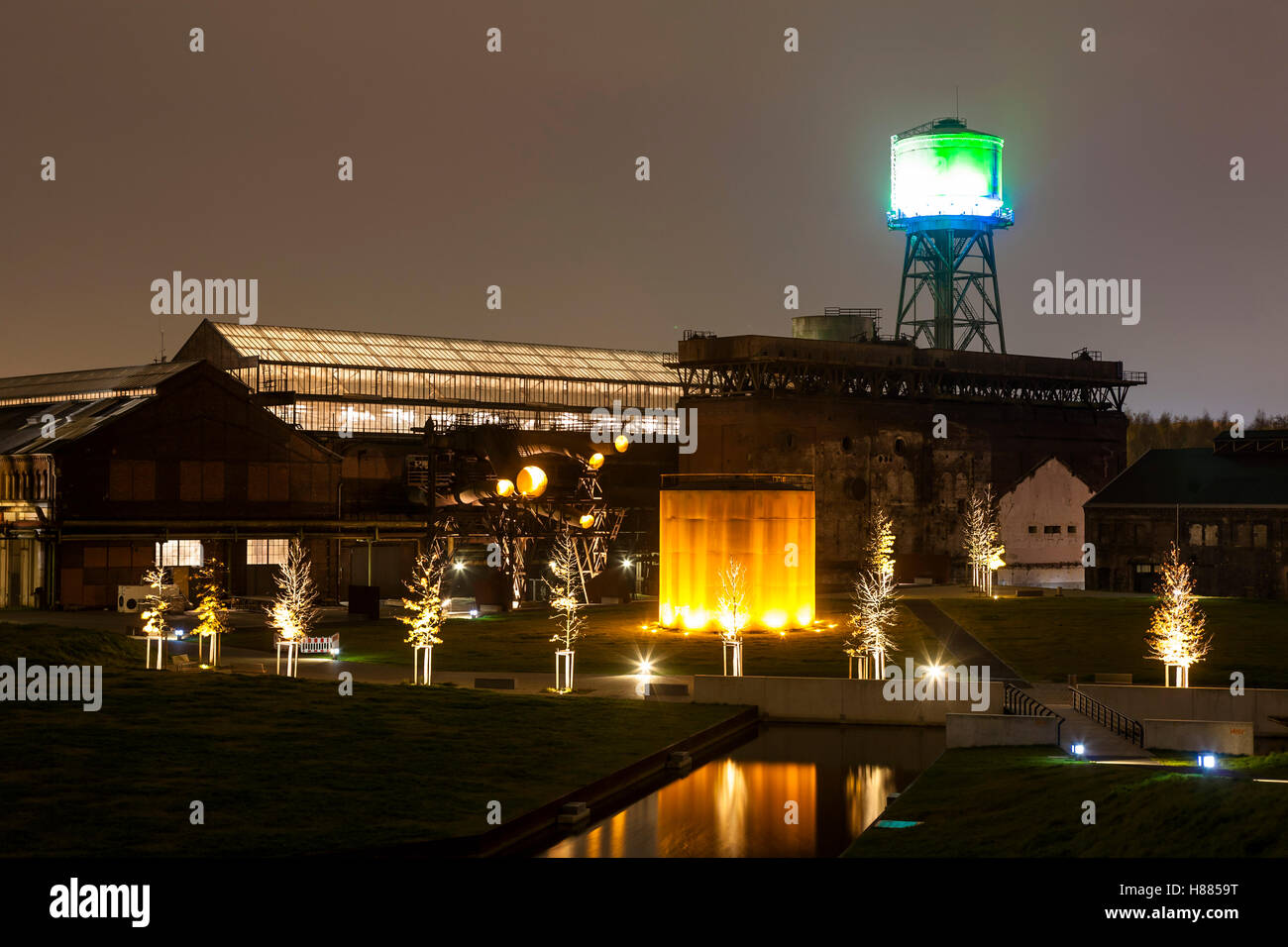 Germany, Ruhr area, Bochum, the Westpark, illuminated water tower and water tank. Stock Photo