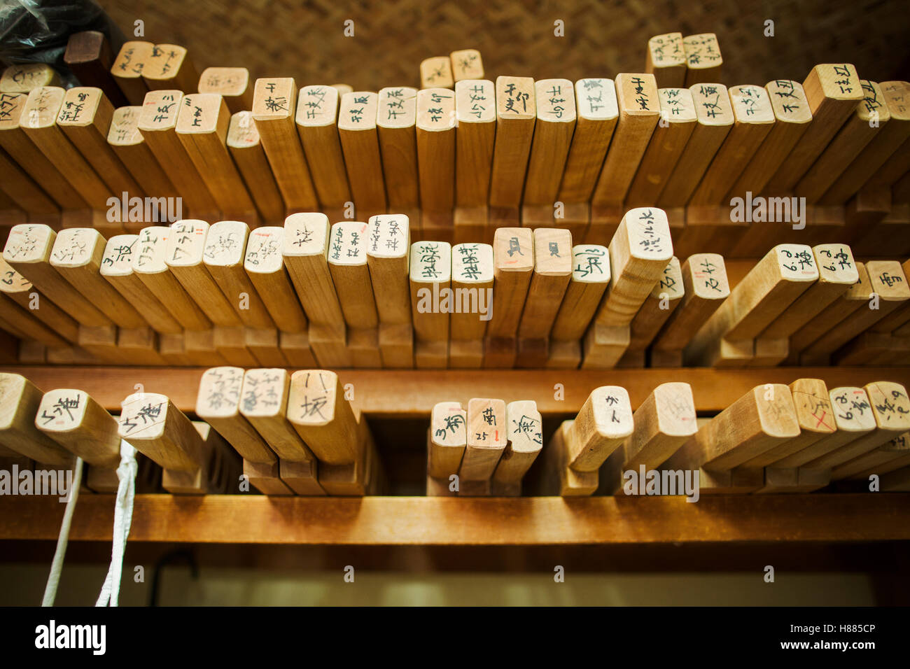 Shelves of wooden moulds for specialist treats, sweets called wagashi. Stock Photo