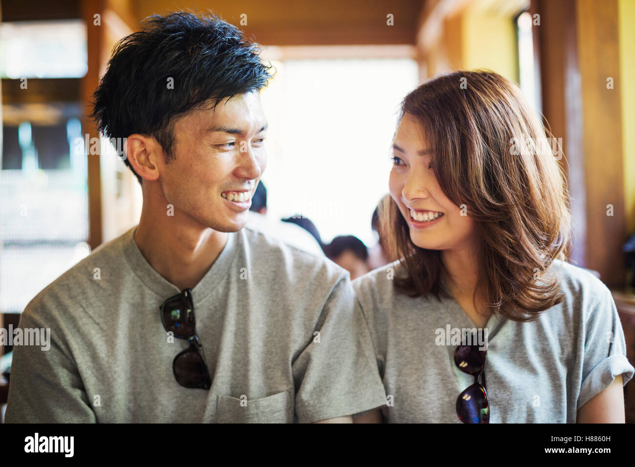 Smiling asian man woman hi-res stock photography and images - Alamy