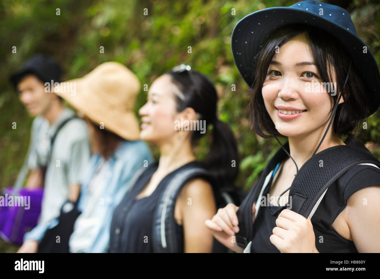 Portrait of three young women and a man. Stock Photo