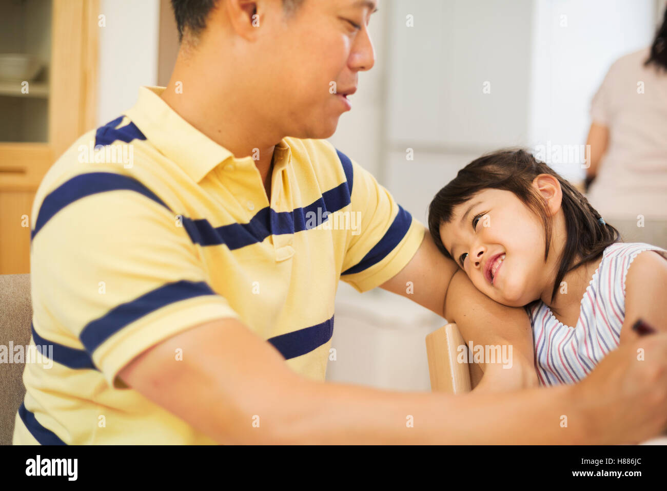 Family home. A man and his daughter. Stock Photo