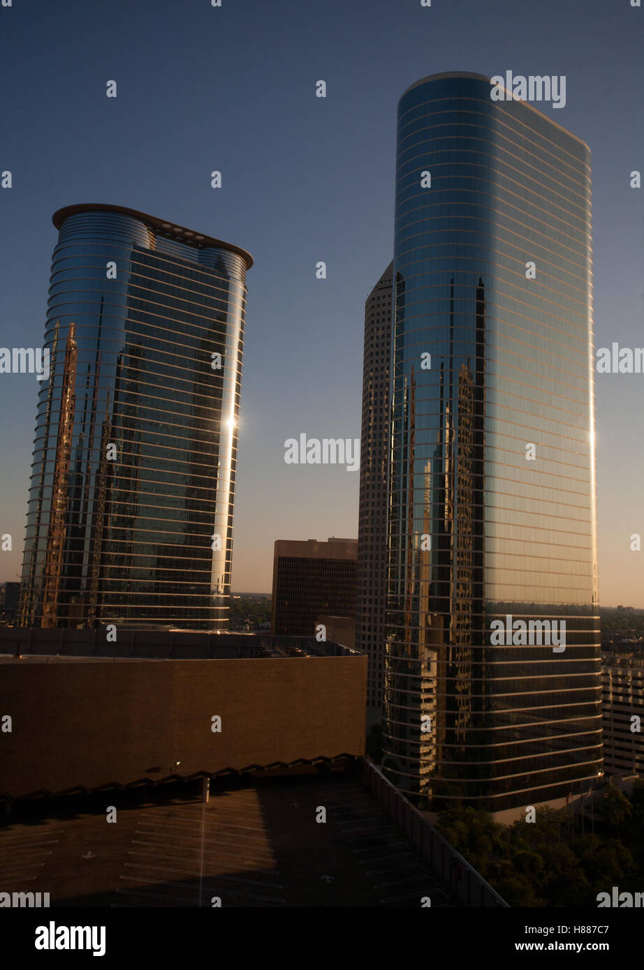 Skyscrapers reflecting the orange sunset in a downtown Stock Photo - Alamy