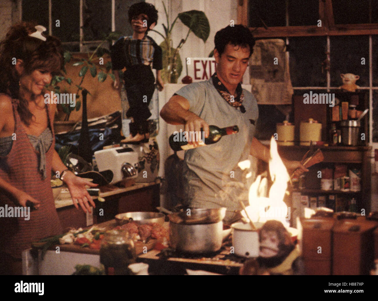 Bachelor Party, (BACHELOR PARTY) USA 1984, Regie: Neal Israel, TAWNY KITAEN, TOM HANKS, Stichwort: Küche, Flambieren, Feuer, Flamme, Kochen Stock Photo