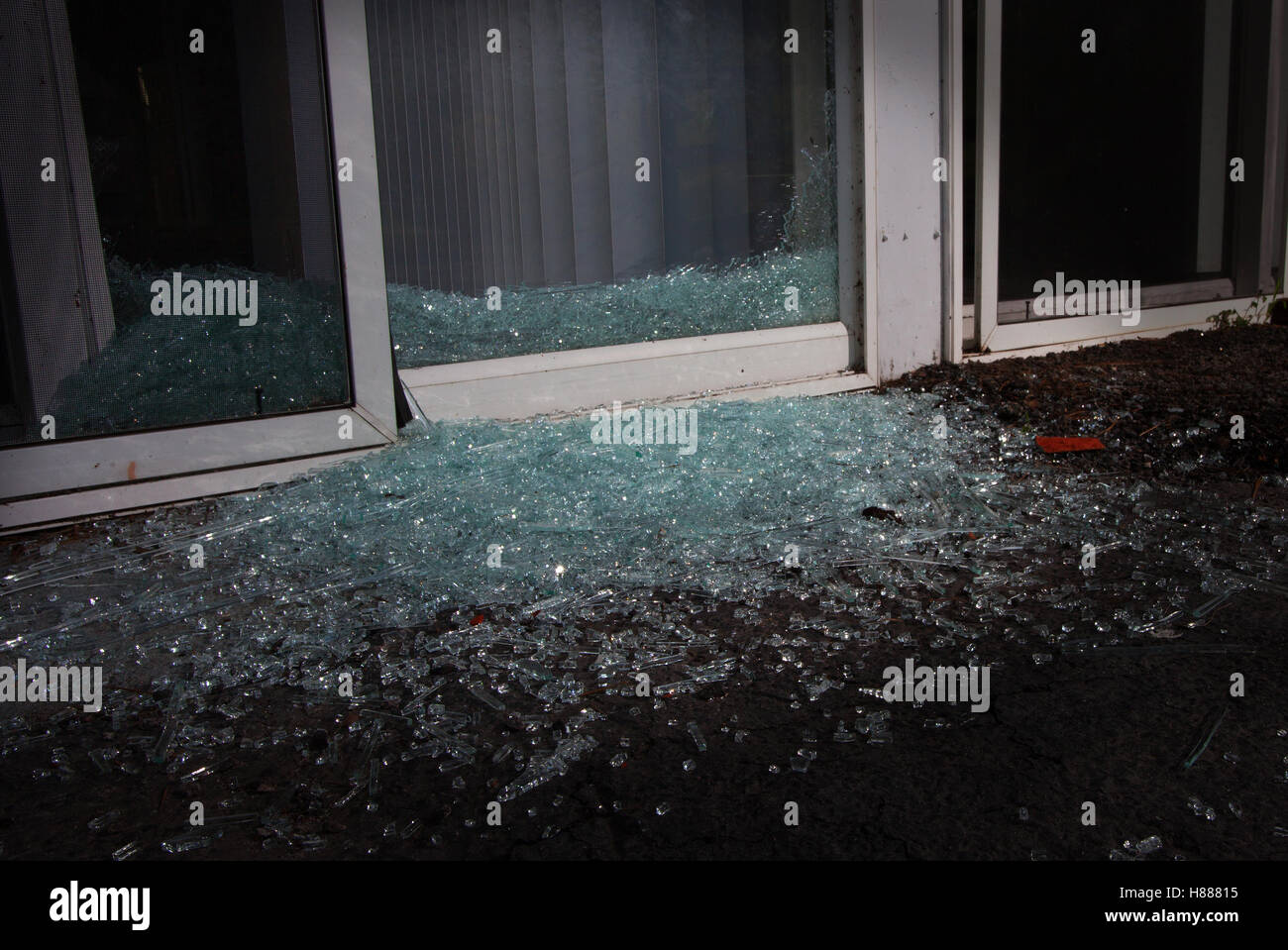 Shattered glass in the night near a sliding glass door Stock Photo Alamy