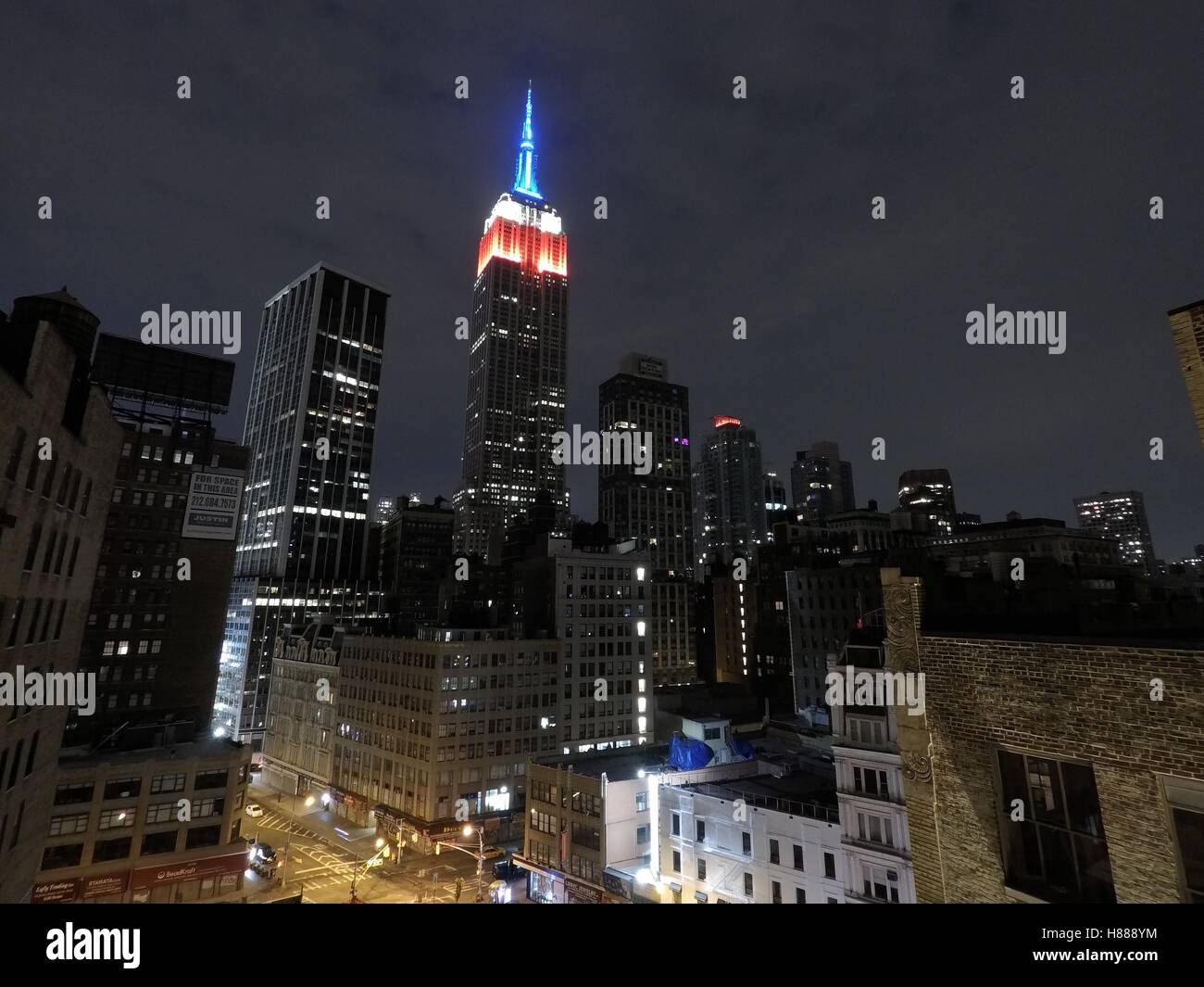 The Empire State Building in New York is lit up red, white and blue ...
