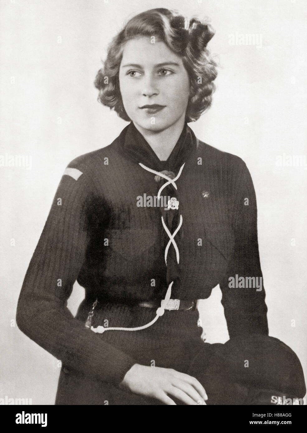 Princess Elizabeth, future Elizabeth II, 1926 - 2022.  Queen of the United Kingdom, Canada, Australia and New Zealand.  Seen here in 1943 dressed in a girl scout uniform.  From a photograph. Stock Photo