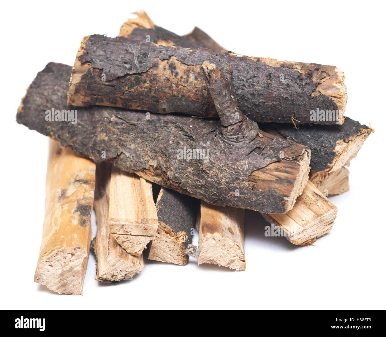 stack of firewood isolated on white background Stock Photo - Alamy
