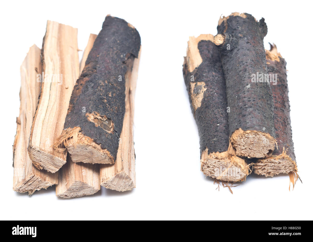 stack of firewood isolated on white background Stock Photo - Alamy